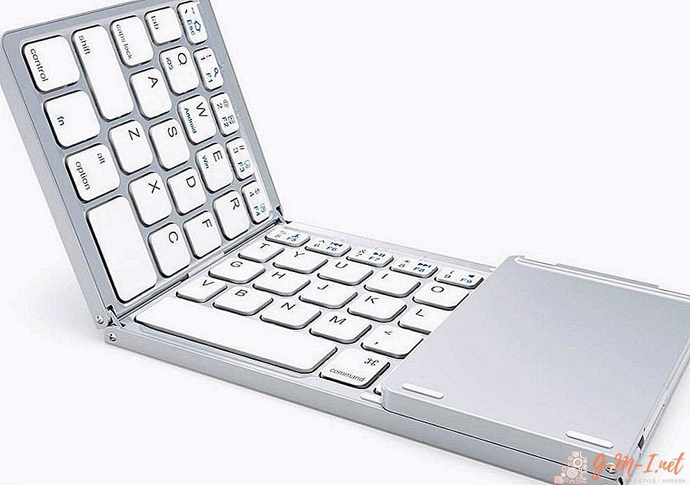 Bagaimana untuk menyambungkan papan kekunci bluetooth ke komputer riba