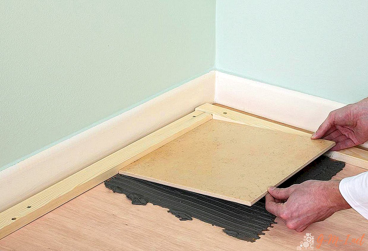 How to put tiles on a wooden floor