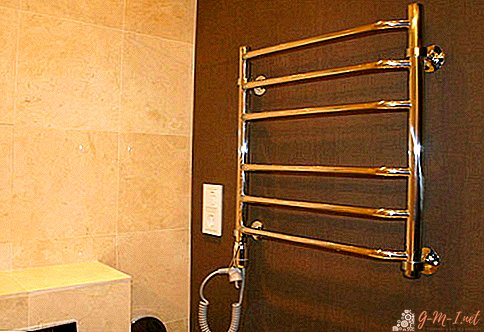 How does an electric heated towel rail