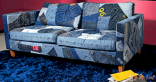 Upholstered sofa with old jeans