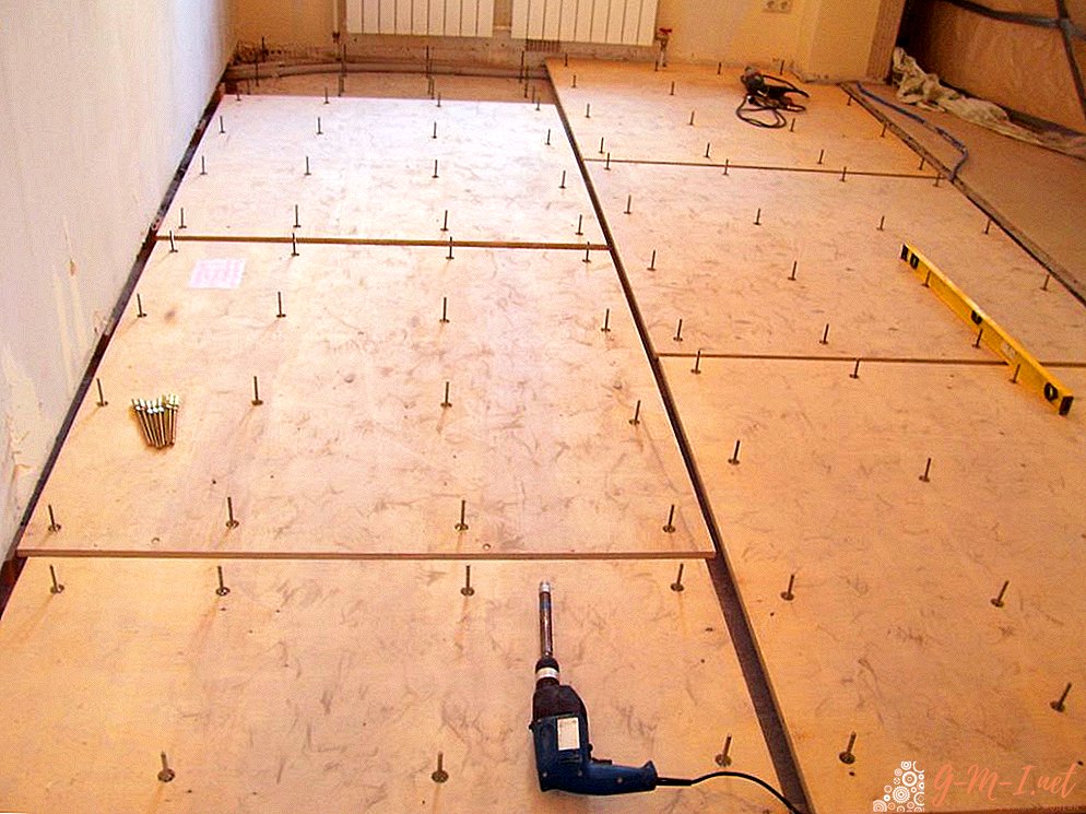 Laying plywood on a concrete floor under a laminate